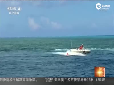 中国海警阻止菲青年登黄岩岛插旗视频曝光