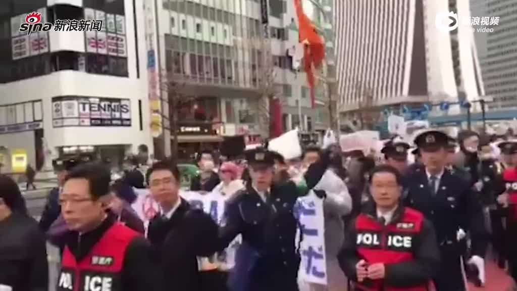 现场：在日华人抗议APA酒店游行 受右翼群体干扰